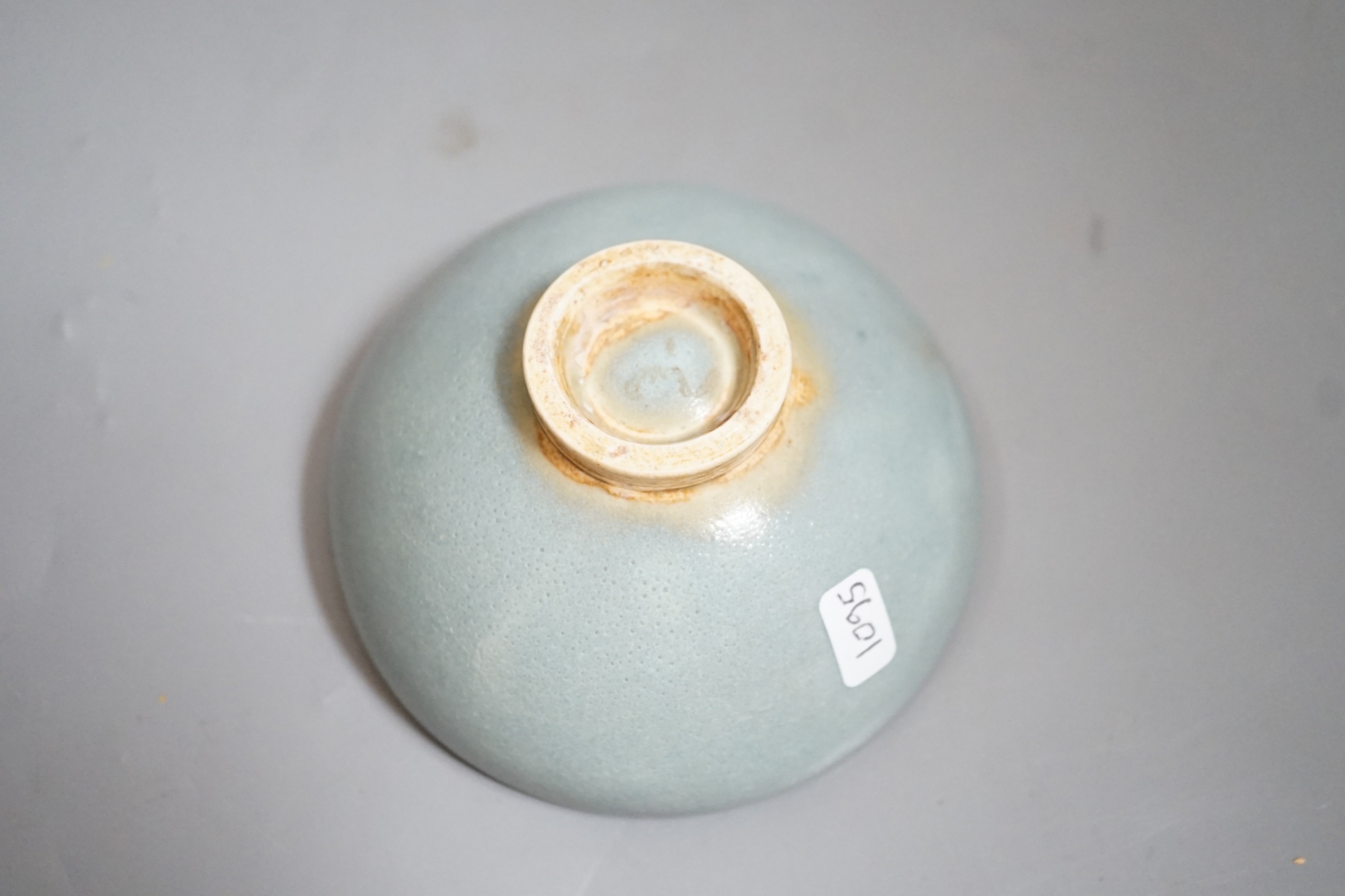A Jun type purple splashed bowl, 9.5 cms diameter
